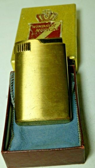 Windsor Deluxe Musical Lighter,  Plays " Oh Susanna " Brass.  And Sleeve