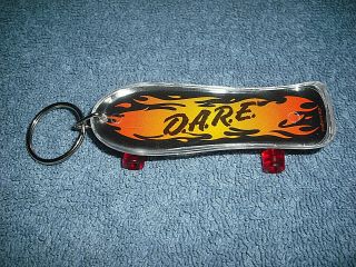 Vintage D.  A.  R.  E.  To Keep Kids Off Drugs 3 1/4 " Mini Plastic Skateboard Keychain