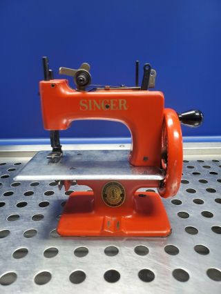 Vintage Red Singer Toy Sewing Machine