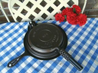 The Griswold Mfg.  Co.  American No.  8 Cast Iron Waffle Iron And Low Base