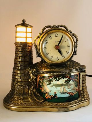 Vintage United Clock Corp Brass Tone Sailboats Lighthouse Motion Clock 2