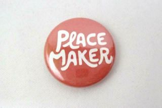 Peace Maker Metal Button Pin Back Light Red Background