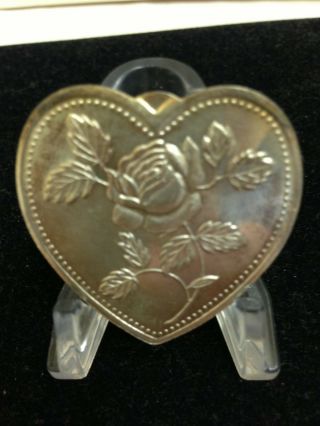 Hearts & Flowers -.  999 Silver 1 Troy Ounce - Fancy Round