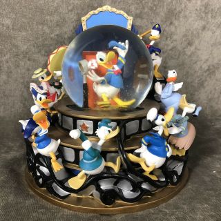Disney Donald Duck “through The Years” Large Snow Globe