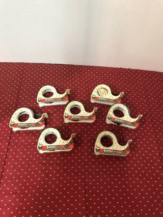 7 Vintage Hristmas Metal Scotch Tape Dispensers Several Colors Of Tape.