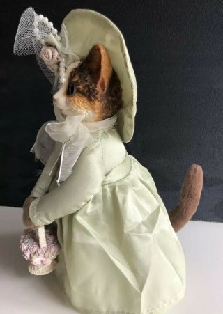 Artisan Flair Inc. ,  Cat in Green Dress and Bonnet Holding Ceramic Flower Basket 2