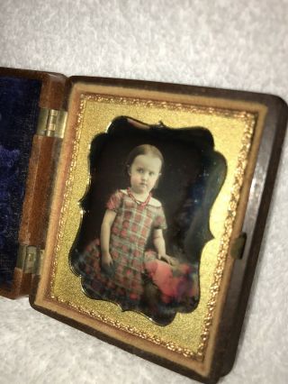 1/9th Plate Tinted Daguerreotype Of A Child In Union Case