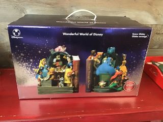 Disney Store Wonderful World Of Disney Through The Years Book End Snow Globe Set