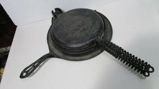 Griswold Mfg.  Co.  885 American No.  8 Cast Iron Waffle Iron And Low Base