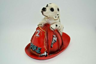 Firefighter Helmet With Dog Statue