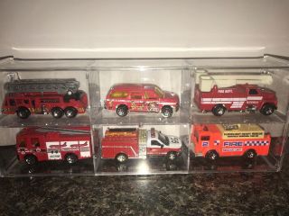 Matchbox Assorted Trucks In Acrylic Case 1991,  1989,  1999,  1999,  1998,  1982