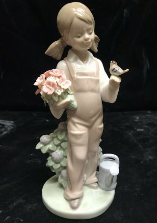 Lladro Porcelain Figurine Spring 5217 Girl With Bird Holding Flower