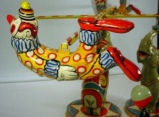 VINTAGE 1940 ' s UNIQUE MFG CO.  INC.  FLYING CIRCUS TIN TOY 3