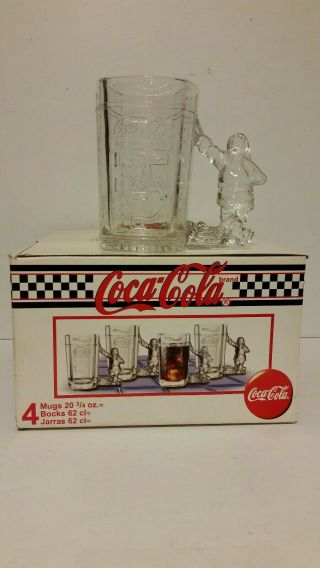 Four 1997 Collectible Coca Cola Santa Coke Machine Glass Mugs / Steins