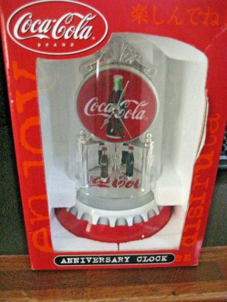 Coca Cola Anniversary Clock With Coke Bottle Designs That Spins -