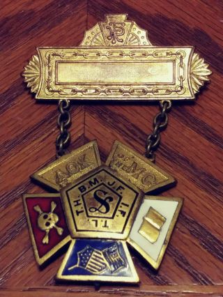 Vintage A.  O.  K.  - M.  C.  Emblem Medal Pinback Fraternity Association Brass