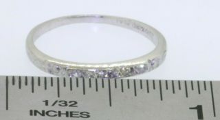 Antique Platinum elegant.  07CTW VS1/G diamond band ring size 5.  25 2