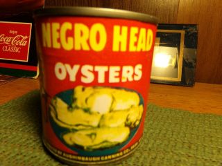 1 Negro Head Oyster Can