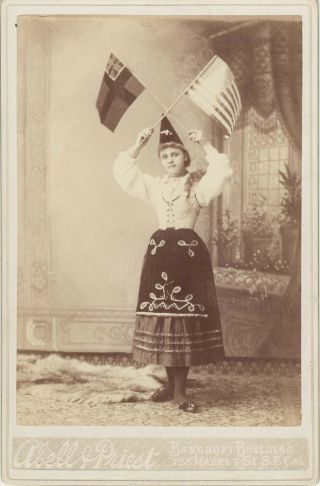 Cabinet Card Of A Woman In Native Dress Holding An American Flag