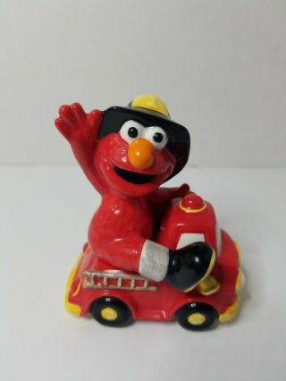 1993 Enesco Jim Henson Fireman Elmo And Fire Truck Salt And Pepper Shaker Set