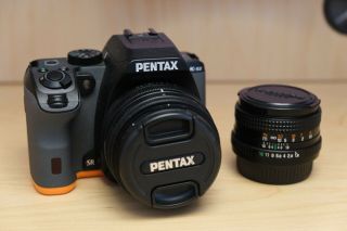 Pentax K - S2 20mp Camera Body,  18 - 55mm Lens,  And Vintage 50mm Prime Lens