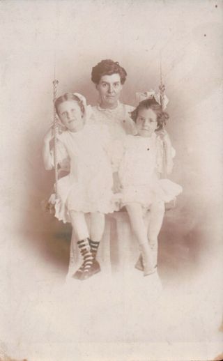 Victorian Mom & Daughters On Swing Posing In Studio For Birthday Greeting 1900s