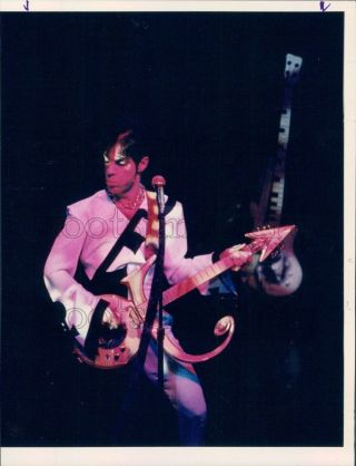 Press Photo Purple One Singer Prince Playing Symbol Guitar On Stage