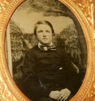 1/9th Plate Ambrotype Of A Young Man In Half Case
