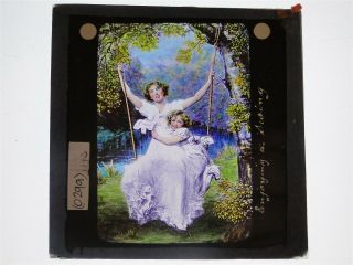 Woman & Child On Swing - Coloured Glass Lantern Slide