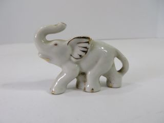 Vtg Miniature Elephant Figurine Made In Japan Ceramic White Raised Trunk 7503