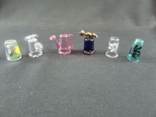 Six Assorted Glass Souvenir Thimbles