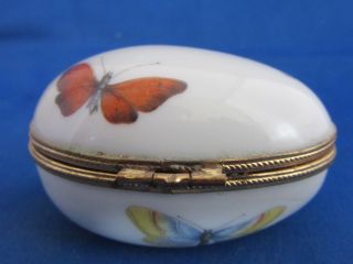 Vintage Limoges France porcelain lidded trinket box egg shaped with butterflies 3