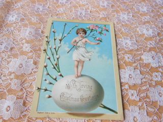 Victorian Christmas Card/small Child Holding Flowers And Standing On Egg/r.  Tuck