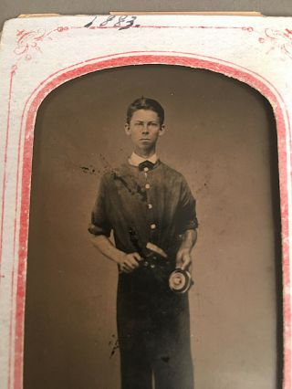 Occupational Tintype Of A Young Man Holding A Hammer,  A Piece Of Pewter Or Tin?