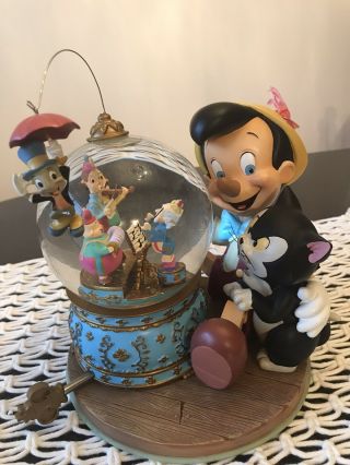 Walt Disney Pinocchio Music Box Snow Globe " Brahms Waltz "