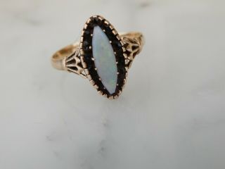A Vintage 9 Ct Gold Marquise Opal And Dark Stone Cluster Ring