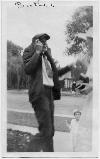 Old Photo Out Of Frame Woman Holding Camera Man Trying To Hide From Photographer