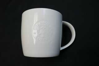 Starbucks Coffee - 2009 White Bone China Embossed Siren Logo 16oz Cup Mug