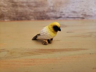 Yowie Collectible Mini Palila Yellow White Bird Mini Figure Sitting On A Branch