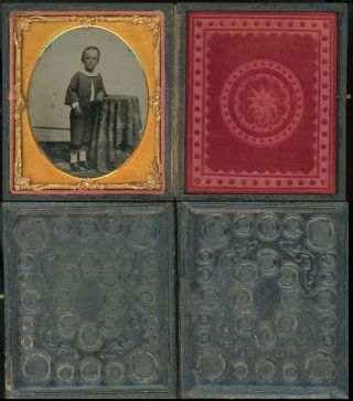 1/6 Plate Ambrotype In Full Case Of Young Boy Standing Near Covered Table