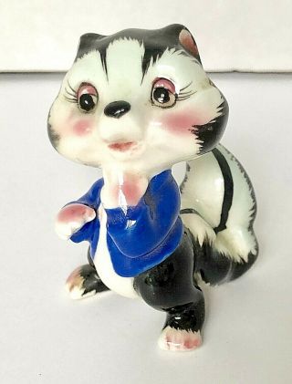 Vintage Ceramic Skunk Figurine Numbered 2.  5 "