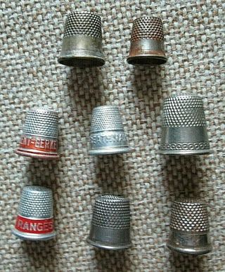 8 Vintage Advertising Thimbles And Others