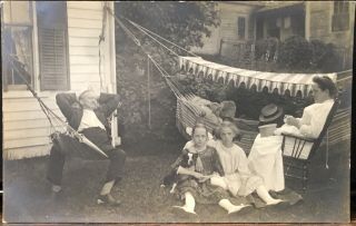 Real Photo Postcard Rppc Family Outdoors Men In Hammocks Woman Sewing Girls Dog
