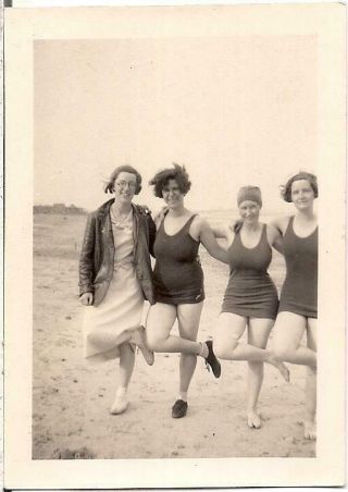 Silly Shoulder To Shoulder Wool Swimsuit Girls Doing Funny Pose For Camera Photo