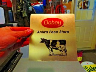 Doboy Aniwa Feed Store With Milking Cow Farm Feed&seed Advertising Sign