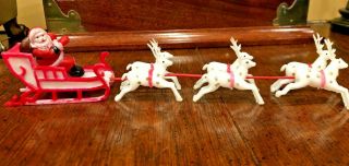 Vintage Plastic Christmas Santa And Sleigh With 6 Reindeer