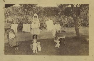Photo Of Girls Playing With Dolls In A Garden C1870s