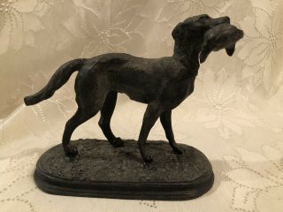 Antique Spelter Sculpture Of A Hunting Dog With A Partridge In His Mouth.