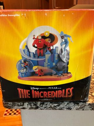 Disney The Incredibles Snow Globe.  Never Removed Fully From.