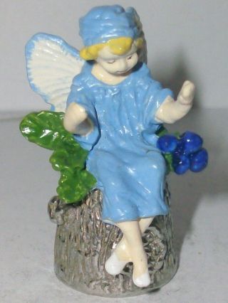 A Pewter Stephen Frost Hand Painted Thimble - - A Blue Flower Fairy - -